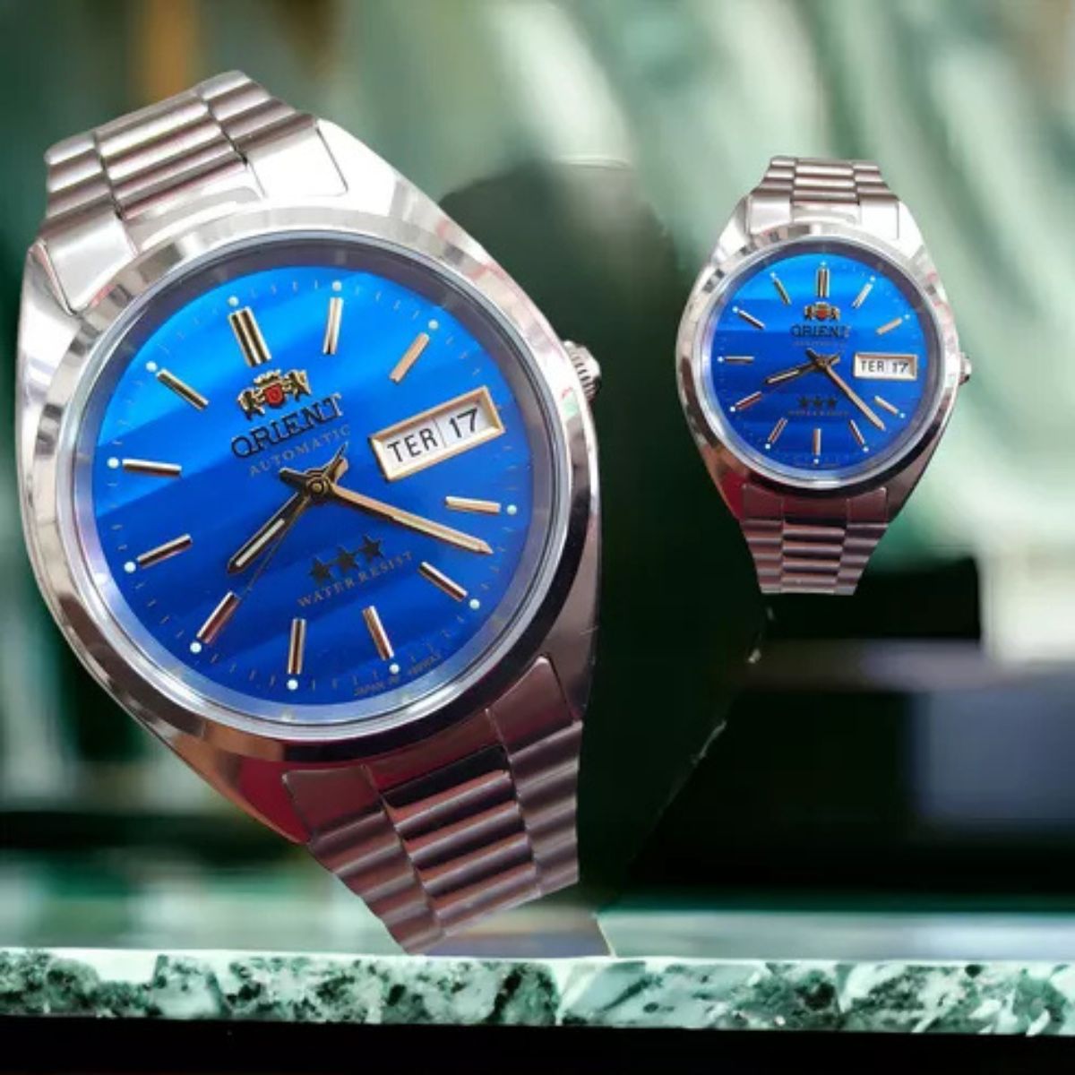 Relógio Orient Masculino  Prata Bisel Prateado Fundo Azul